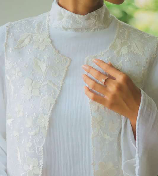 White embroidered textile